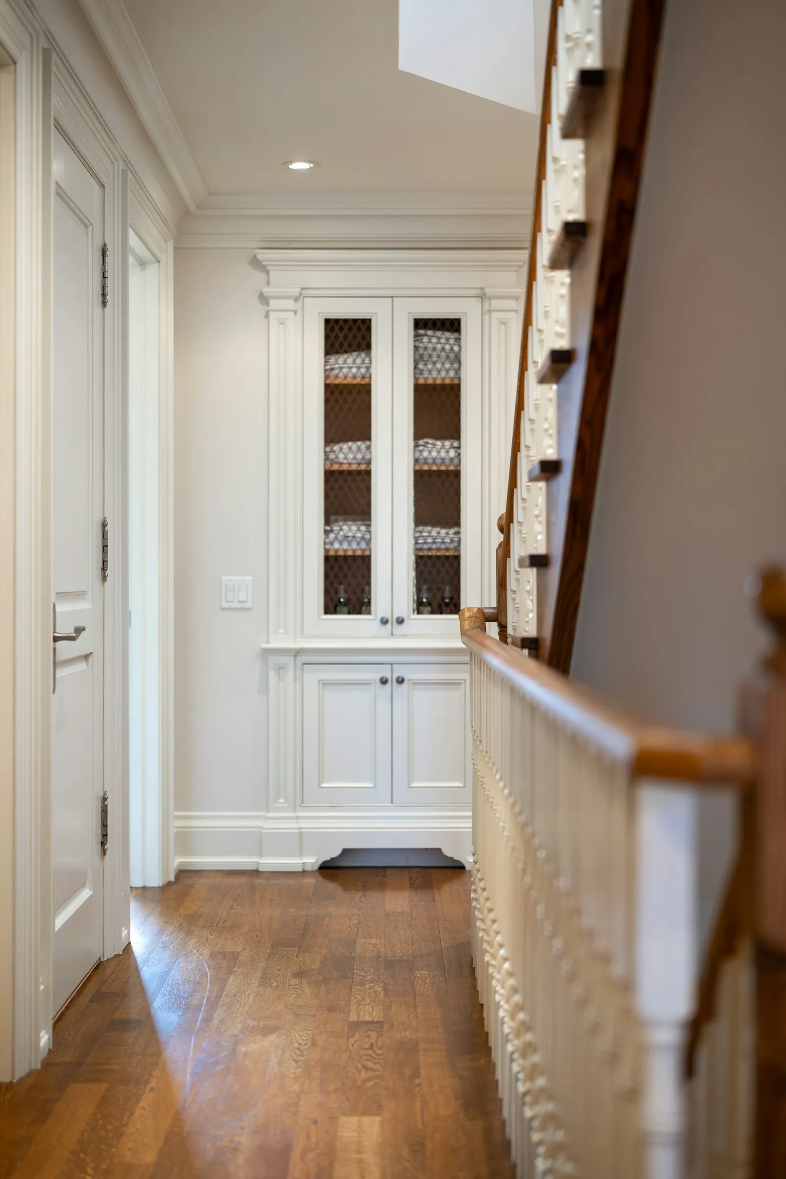 Freshly painted white trim, baseboards, crown moulding, and interior doors